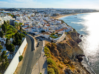 Aerial view landscape, Algarve Portugal Albufeira. Street, houses, beach, ocean, sunny beautiful day. View of the horizon.