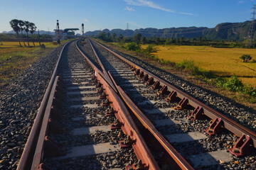 A view of the railroad tracks in the countryside in indonesia