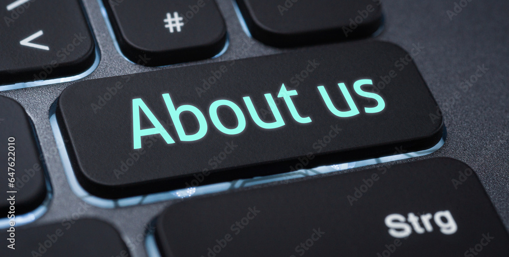 Wall mural illuminated keyboard with a labeled key - about us