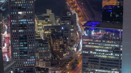 Fototapeta na wymiar Office skyscrapers in financial district aerial day to night timelapse