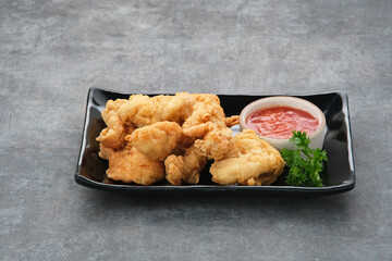 Crispy chicken fillets (ayam goreng tepung) with chilli sauce
