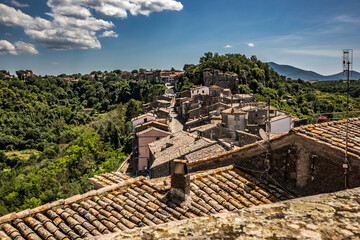 Town of Bomarzo, Viterbo, Italy. Travel street view of city architecture and details. Sunny warm...
