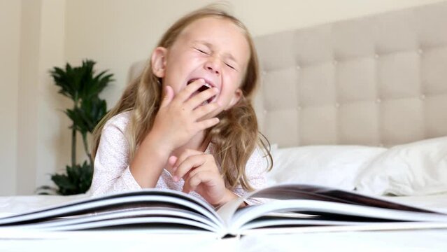 Emotional excited child read interesting funny comedy. comics short stories for kids. Small kid enjoy reading book cheerful laugh. Imaginary world Fairy tale story. Bedtime toddler read. Kids emotions