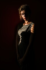 Naklejka premium Sensual Portrait of a Fictional Lady Silhouette Playing with Darkness Shadow and Light. Generative AI.