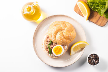 Delicious tuna open sandwiches. Buns with canned tuna, lemon, cream cheese and boiled egg.