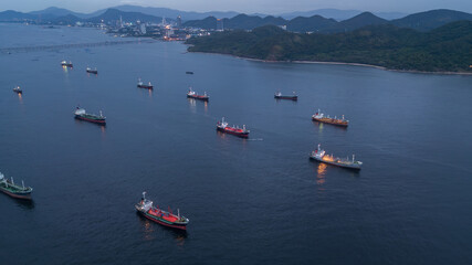 Obraz premium Aerial view oil chemical tanker at sea, Industrial crude oil and fuel tanker ship in deep blue ocean sea.