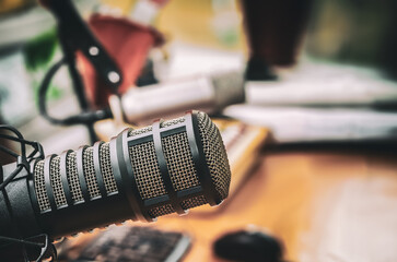 Professional microphone and sound mixer in radio station studio
