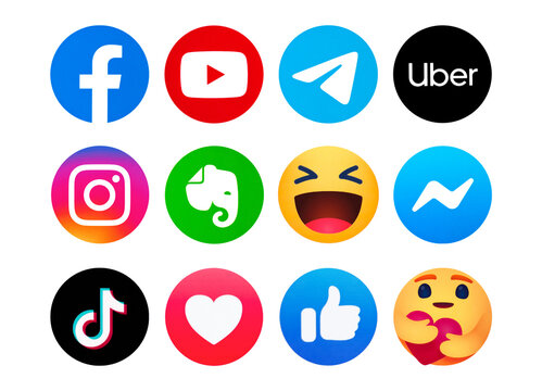 Kiev, Ukraine - January 11, 2021: Set of most  popular social media logos printed on paper: Facebook, YouTube, Telegram, Uber,  Instagram, Evernote, Messenger, TikTok,  Facebook like button 