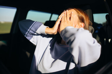 angry tired woman driving a car, woman driver conflict.