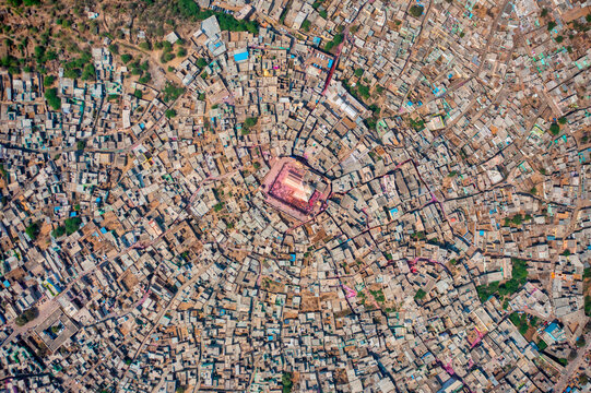 Aerial view of people celebrating the holy colour festival near the Shri And Baba Temple, Uttar Pradesh, India.