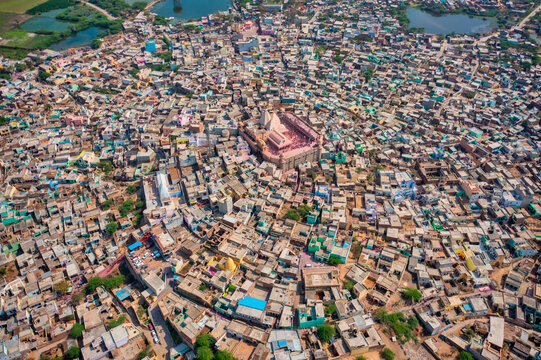 Aerial view of people celebrating the holy colour festival near the Shri And Baba Temple, Uttar Pradesh, India.