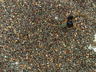 Dhaka, Bangladesh - 11 June 2023: Aerial view of a people working in a plastic Waste treatment plant, Tangail, Bangladesh.