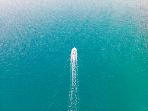 Aerial view of small boat on Adriatic sea in Vrsi, Croatia.