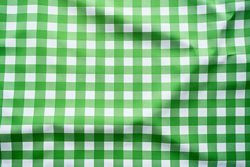 A green checkered table cloth shot . 