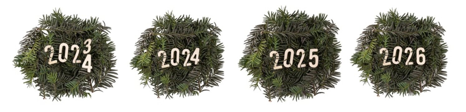 the frame of Christmas trees and wooden figures are isolated on a white background. round frame made of fir branches. 2023, 2024, 2025, 2026