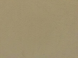 Beige plastered wall section, copy space