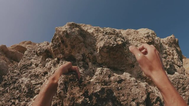 POV Shot, Hands Of Guy Moving Up Rock, Close Up