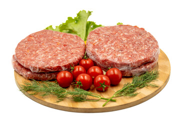 Raw hamburger patty isolated on white background. Raw veal hamburger patties with herbs and spices