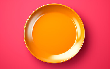 Empty orange plate on table. Top view