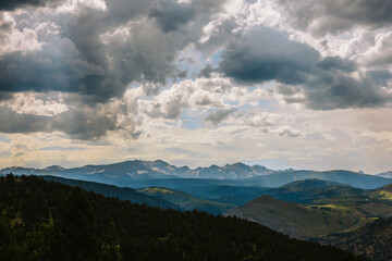 Naklejka premium mountains and clouds