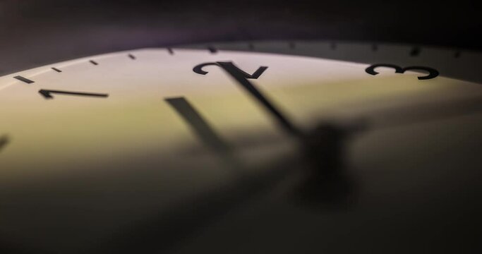 Clock face time lapse. Clock time ticking on a classic Wall Clock. Shadows moving over the Watch. Darkness and light games on the clock face. Concept footage apocalyptic mood moving time pointer