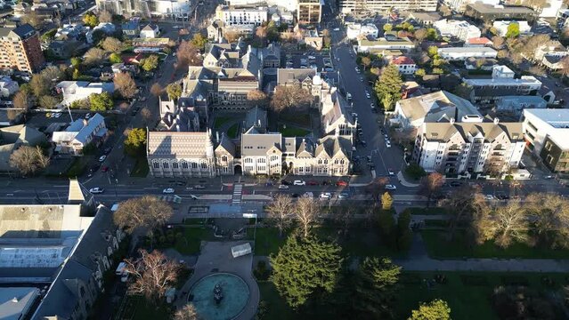 Christchurch, New Zealand: Aerial drone footage of The Arts Centre building in the former Canterbury college with its neo gothic style in Christchurch city historic center. 