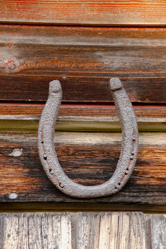 A Horseshoe Mounted On A Wooden Wall; Iron Hill, Quebec, Canada