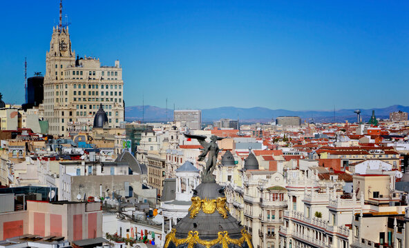 High View Over Centre Of City The Dome And Angel Of The Metropolis Building In The Foreground; Madrid, Spain