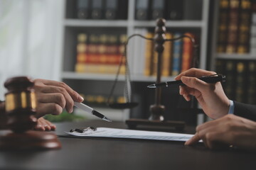Customer service good cooperation, Consultation between a Businessman and Male lawyer or judge consult having team meeting with client, Law and Legal services concept.