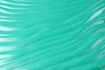 background of green color leather texture of gift box with wave pattern texture design