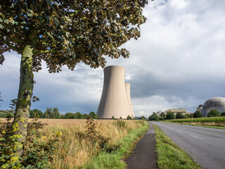 Green landscape and nuclear power plant.