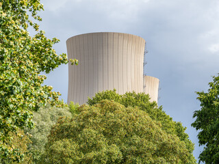 Green landscape and nuclear power plant .