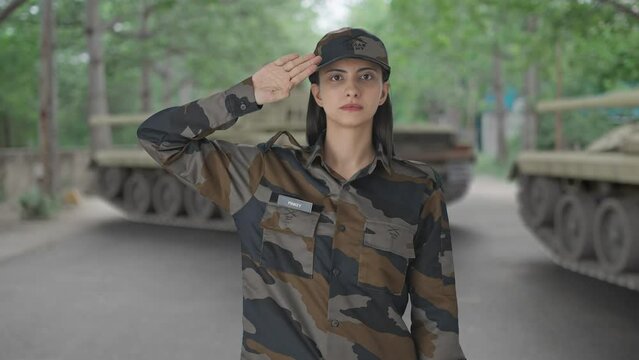Proud Indian woman army officer saluting