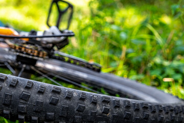 bike in the grass, focus on the tire