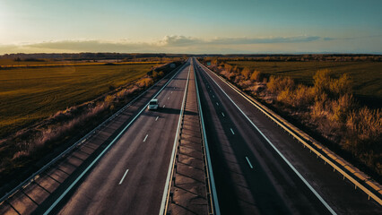 Fototapeta premium Highway road tracks at sunset