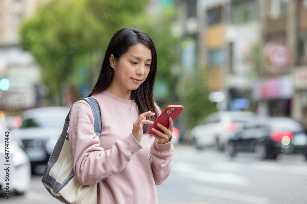 Canvas Prints woman use smart phone in city