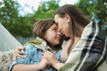 Escaping the weekly grind, a mother and her child find bliss in simple gestures and tight embraces...