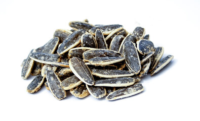 salty sunflower seeds isolated on white