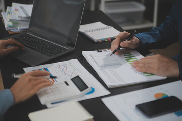 Financial Business team present. Business man hands hold documents with financial statistic stock...