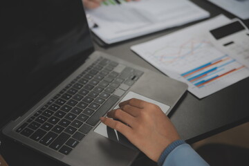 Financial Business team present. Business man hands hold documents with financial statistic stock...