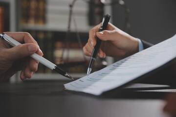female lawyers working at the law firms. Judge gavel with scales of justice. Legal law, lawyer, advice and justice concept.