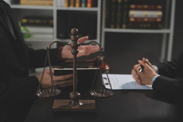 female lawyers working at the law firms. Judge gavel with scales of justice. Legal law, lawyer, advice and justice concept.