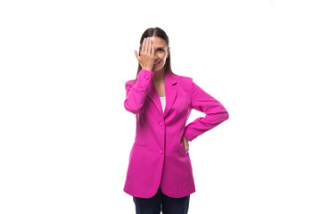 Fototapeta premium portrait of a young slender businesswoman with straight black hair dressed in a lilac jacket