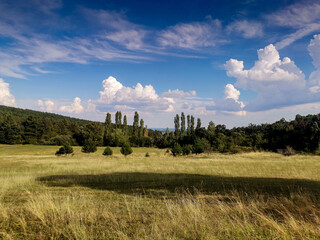 landscape with mountains and clouds