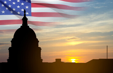 United States Capitol building silhouette and US flags at sunset