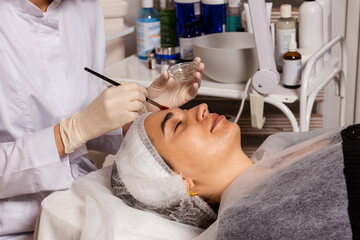 Reception, examination and procedures at the doctor of the skin care clinic