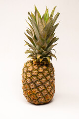 Fototapeta premium Pineapple isolated on white. Top view.
