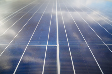 Sky reflection at solar energy panel close-up.