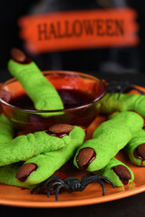 A delicious Halloween treat, Witch's Fingers Green Sugar Cookies with raspberry jam and almonds are the perfect choice for  paleo, vegan look.