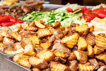 fair. Exhibition, sale baking on shelves. products prepared on a grill. Street festival of food. Concept Picnic, Holiday, Festivities. sale of cooked food